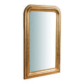 Miroir doré avec cadre orné, style classique